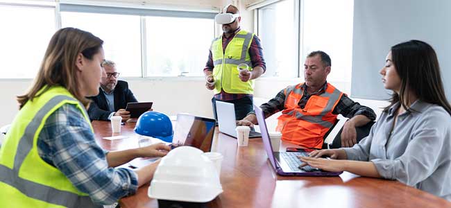Employees in Qatar attending a wellness and safety training session at their workplace.
