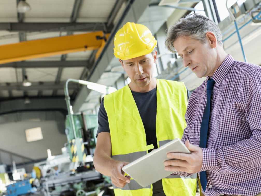 Occupational health expert conducting a health risk assessment at an industrial facility in Qatar.