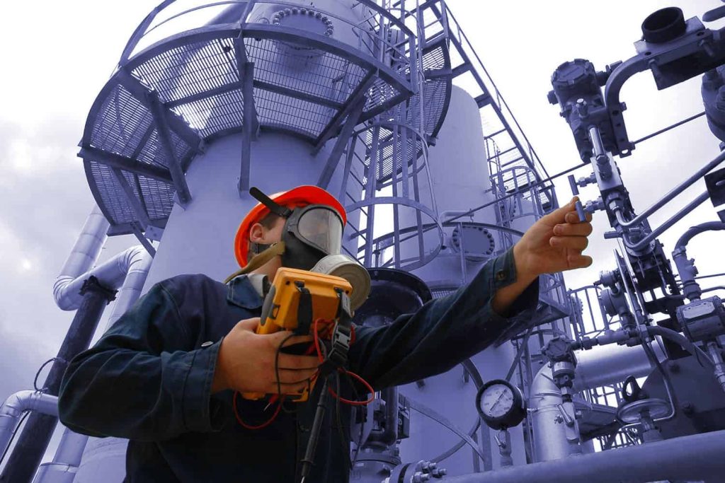 Occupational hygiene specialist measuring thermal stress with equipment during OHTA 502 (W502) training.
