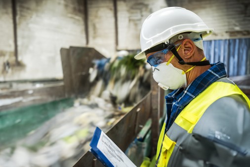 Industrial hygienist conducting gas and vapor sampling in Qatar workplace