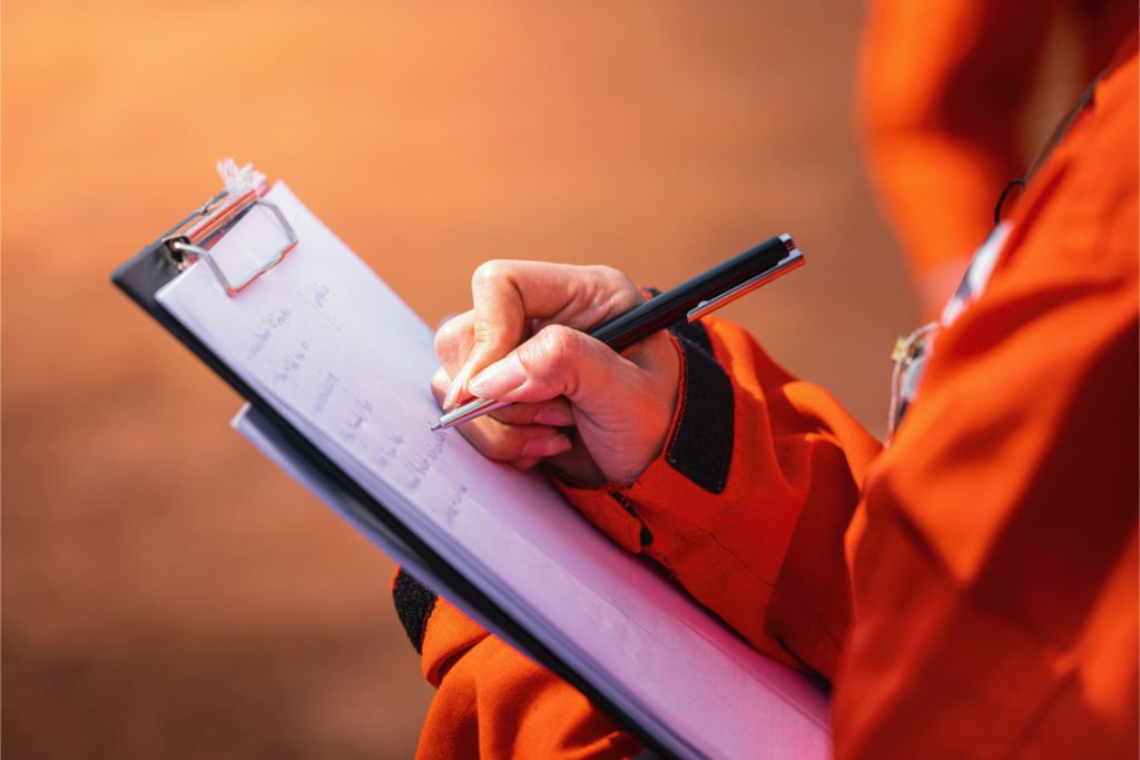 Fire safety consultant reviewing QCDD compliance documents in Qatar