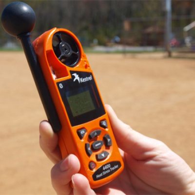 Technician conducting WBGT heat stress monitoring in Qatar