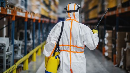 Industrial hygienist conducting workplace exposure monitoring at an industrial site in Qatar