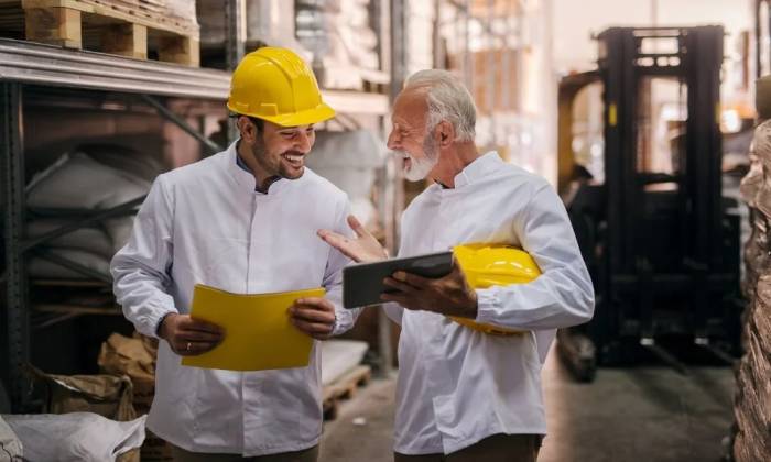 Industrial hygienist assessing chemical hazards and exposure risks in a workplace environment in Qatar